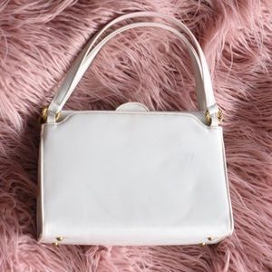 Vintage white patent purse with gold accents